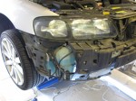 VOLVO V70 イカリング・アイライン施工 バンパーを外した状態です。あとはユニット固定のボルトを外してユニットを分離します。