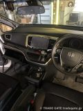 ナビ交換作業中のホンダ オデッセイのダッシュボード。アンドロイドナビが仮装着されている