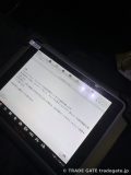 診断機（タブレット）の画面に「インフォメーション」と表示され、自己診断モードの説明文が書かれている